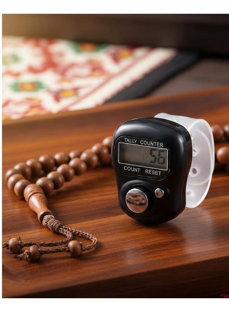 A Black electronic finger tasbeeh ring with a digital screen, a counter button, and a reset button, tasbih ring , prayer beads, tally counter. - Image 1
